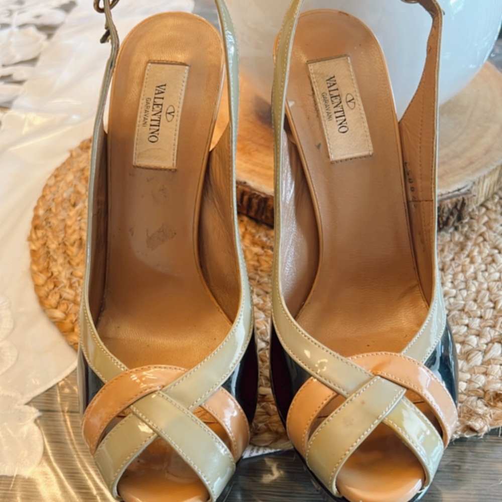 Black slingback Heels with baby green and blush accent. Gently worn but ready.